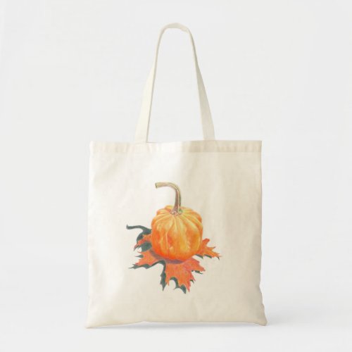 Tote bag with Autumn themed artwork featuring a mini pumpkin on a turned leaf